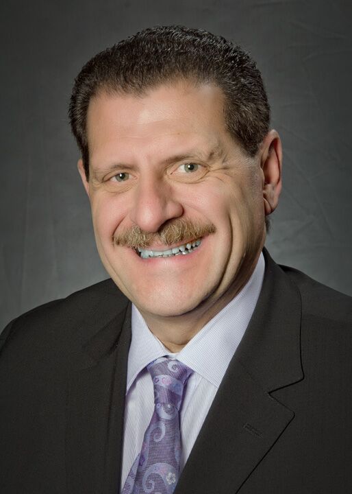 Dr. Giles Scuderi, MD